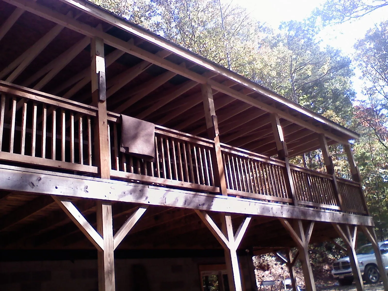 Timber framing under a new elevated porch and deck — Roof Leak Repair in Camas Valley by Roofing Brothers
